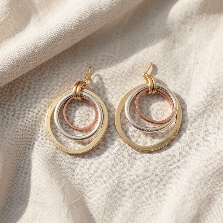 Gold-silberne Ohrringe