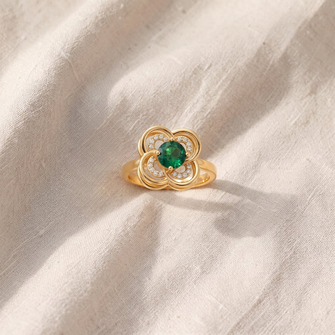 Drehring Kleeblatt Halo mit Smaragd | Gold