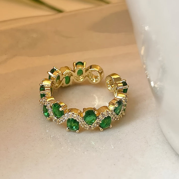 Offener glitzernder Ring Calira mit Smaragd | Gold