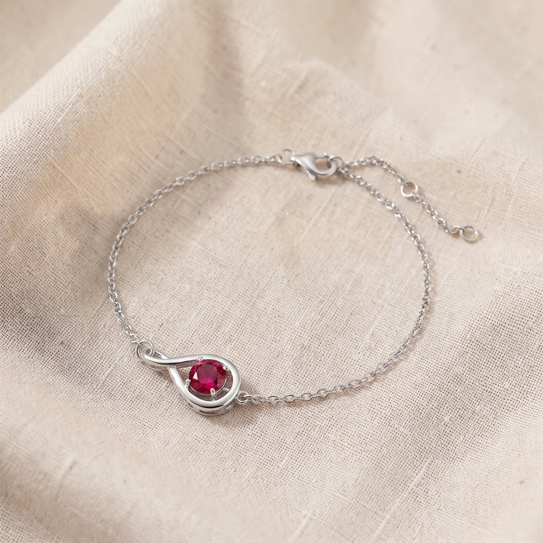 Armband Unendlichkeit mit Rubin | Weissgold