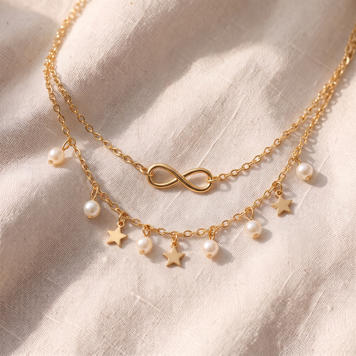Infinity-Fusskettchen mit Perlen und Sternen | Gold