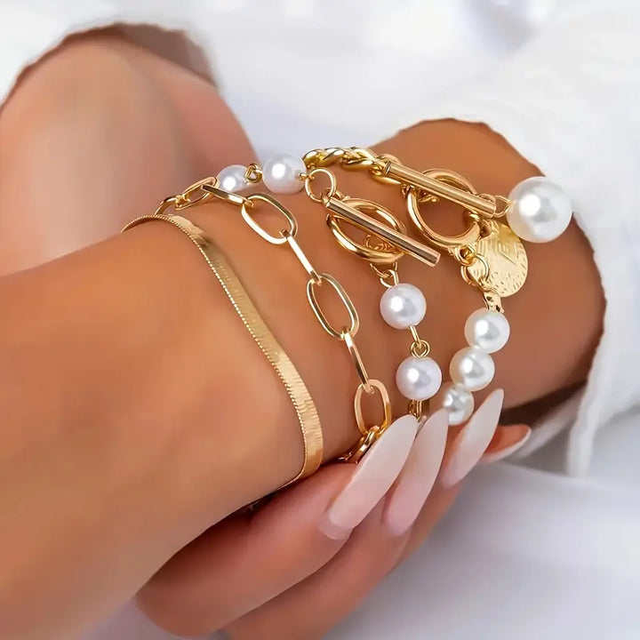 Set mit 4 goldenen Armbändern – Schlangenkette, Perlen und Glieder | Gold