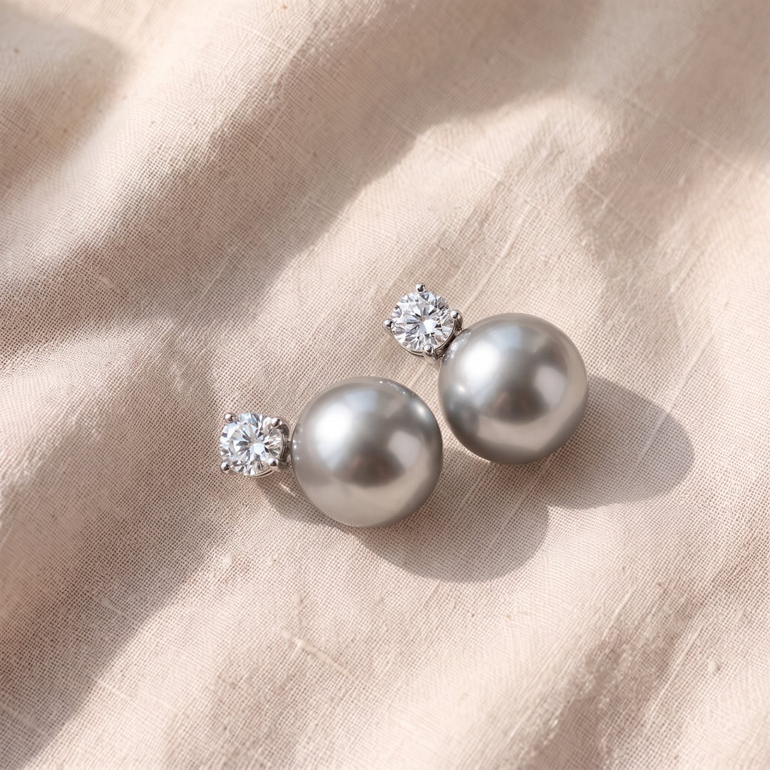 Elegante Ohrringe mit schwarzer Perle und Zirkonia