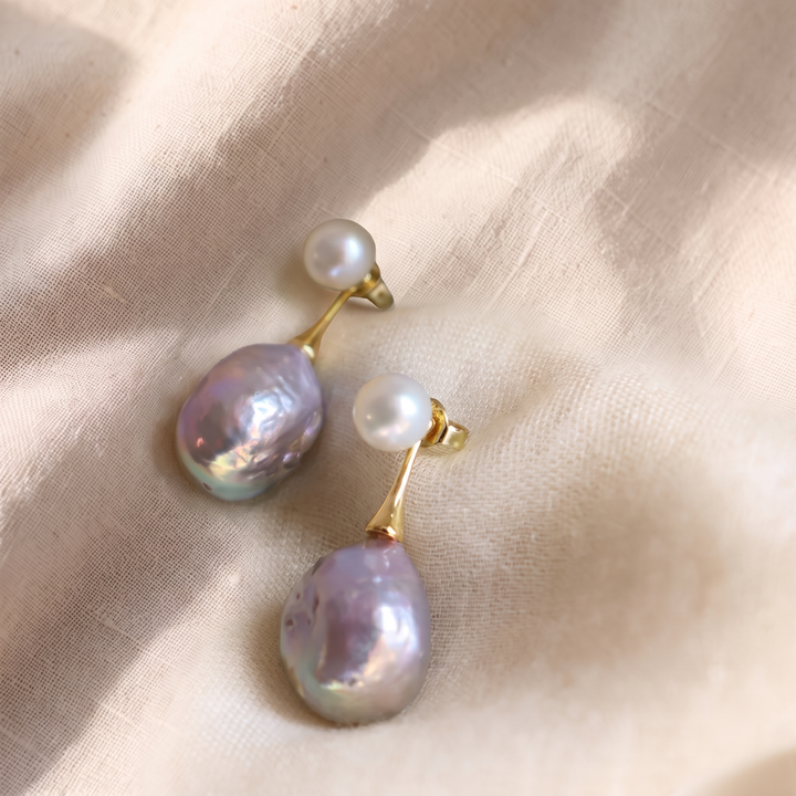 Elegante Ohrringe mit violetter Perle