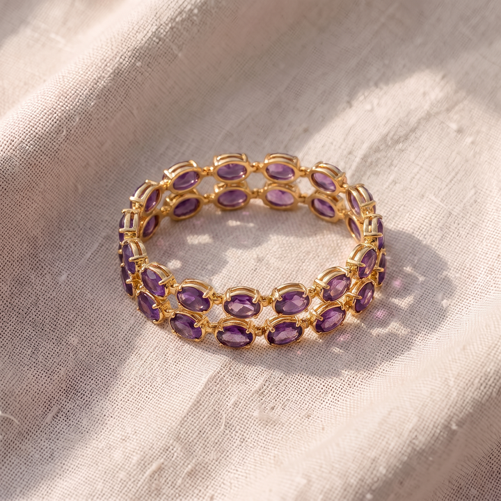 Goldenes Tennisarmband mit Amethysten