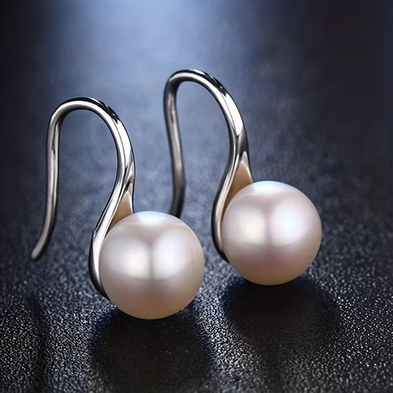 Elegante hängende Perlenohrringe