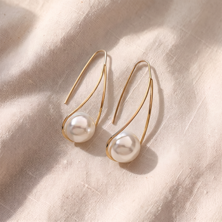 Elegante hängende Perlenohrringe | Gold
