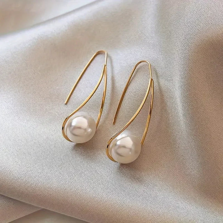 Elegante hängende Perlenohrringe | Gold